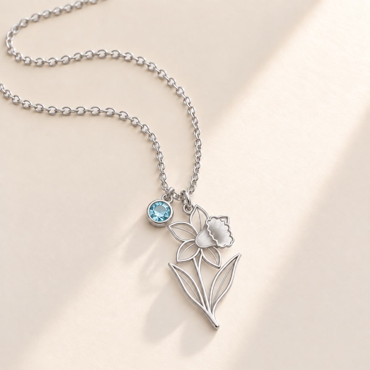 Custom Birth Flower & Birthstone Necklace hero photo - Silver March daffodil birth flower charm with Aquamarine birthstone Anthology Jewelry