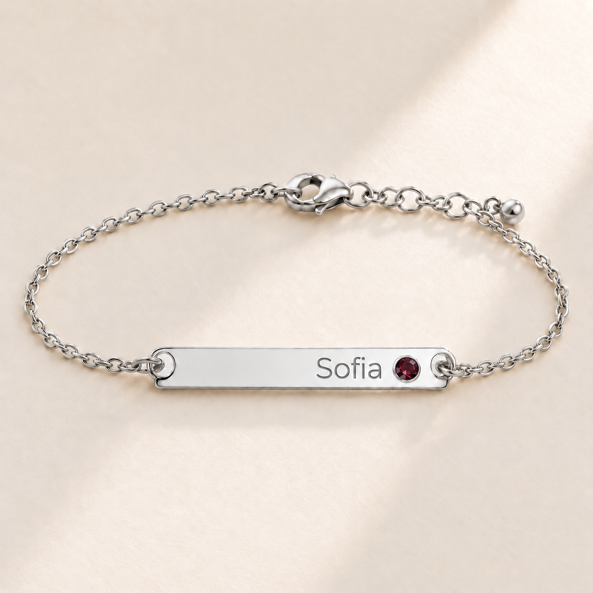 Birthstone Bar Bracelet hero photo - silver january garnet with Sofia engraving in Montserrat Anthology Jewelry