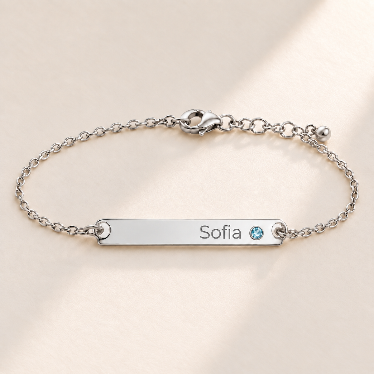 Birthstone Bar Bracelet hero photo - silver March aquamarine with Sofia engraving in Montserrat Anthology Jewelry