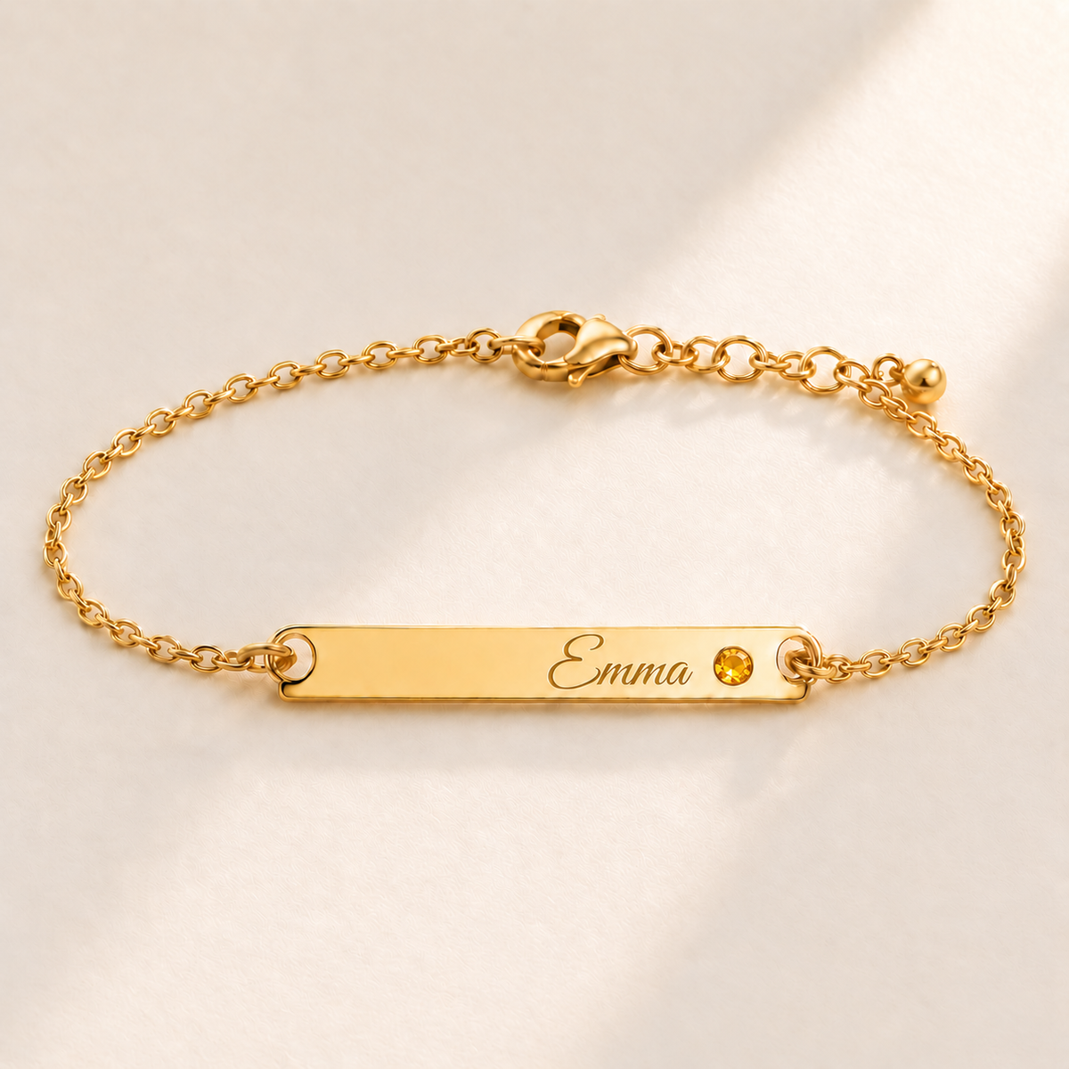 Birthstone Bar Bracelet hero photo - gold november citrine with Emma engraving in Great Vibes Anthology Jewelry