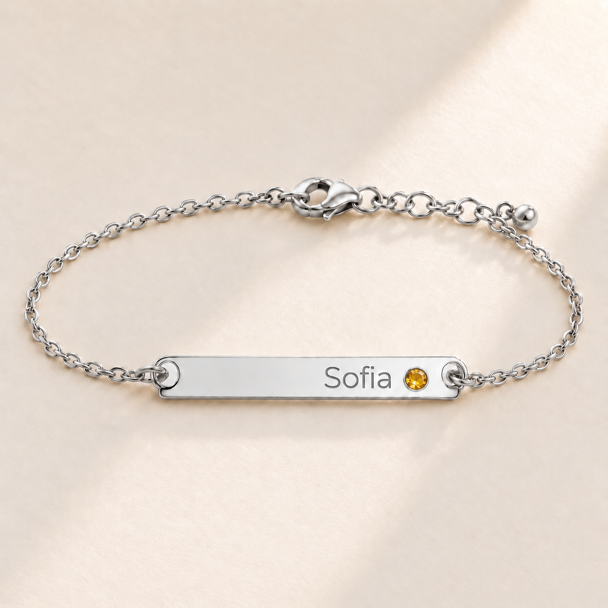 Birthstone Bar Bracelet hero photo - silver november citrine with Sofia engraving in Montserrat Anthology Jewelry
