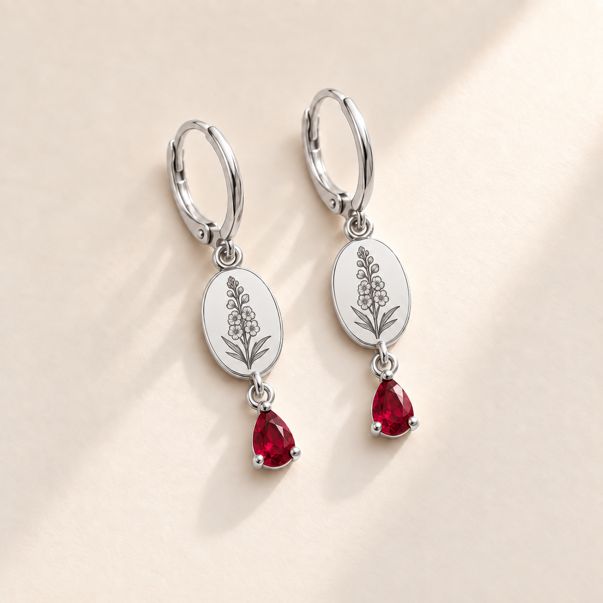 Custom Birth Flower & Birthstone Drop Earrings july silver hero photo - engraved tall larkspur stalk with clustered small flowers, buds and narrow leaves with ruby red pear stones Anthology Jewelry