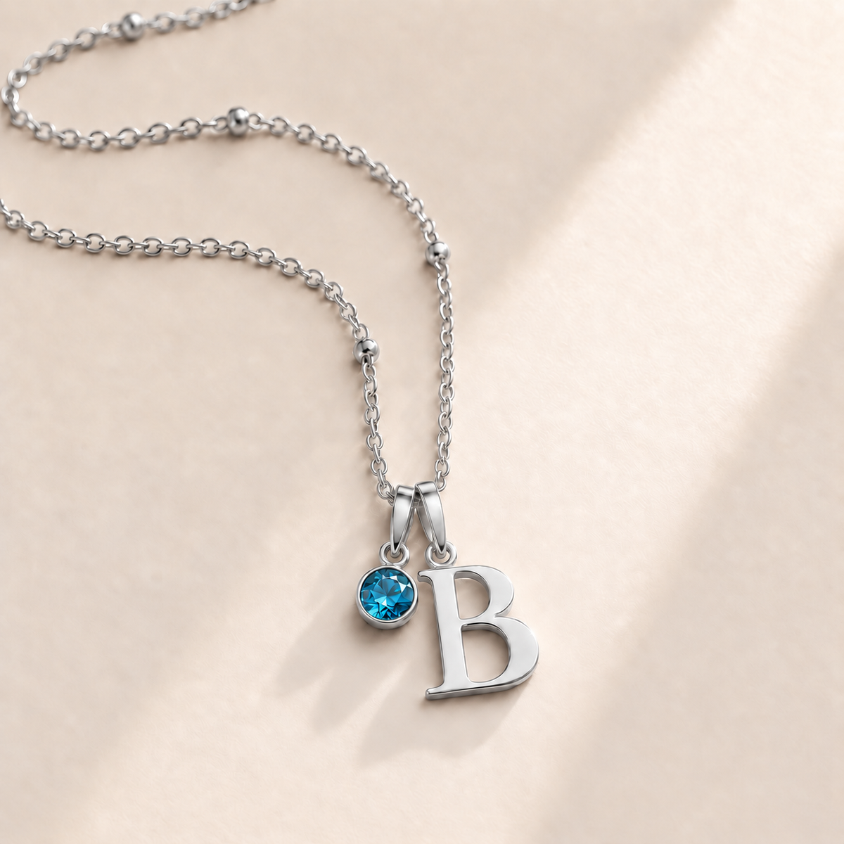Custom Birthstone Initial Necklace december silver birthstone photo - serif initial B with round birthstone Anthology Jewelry