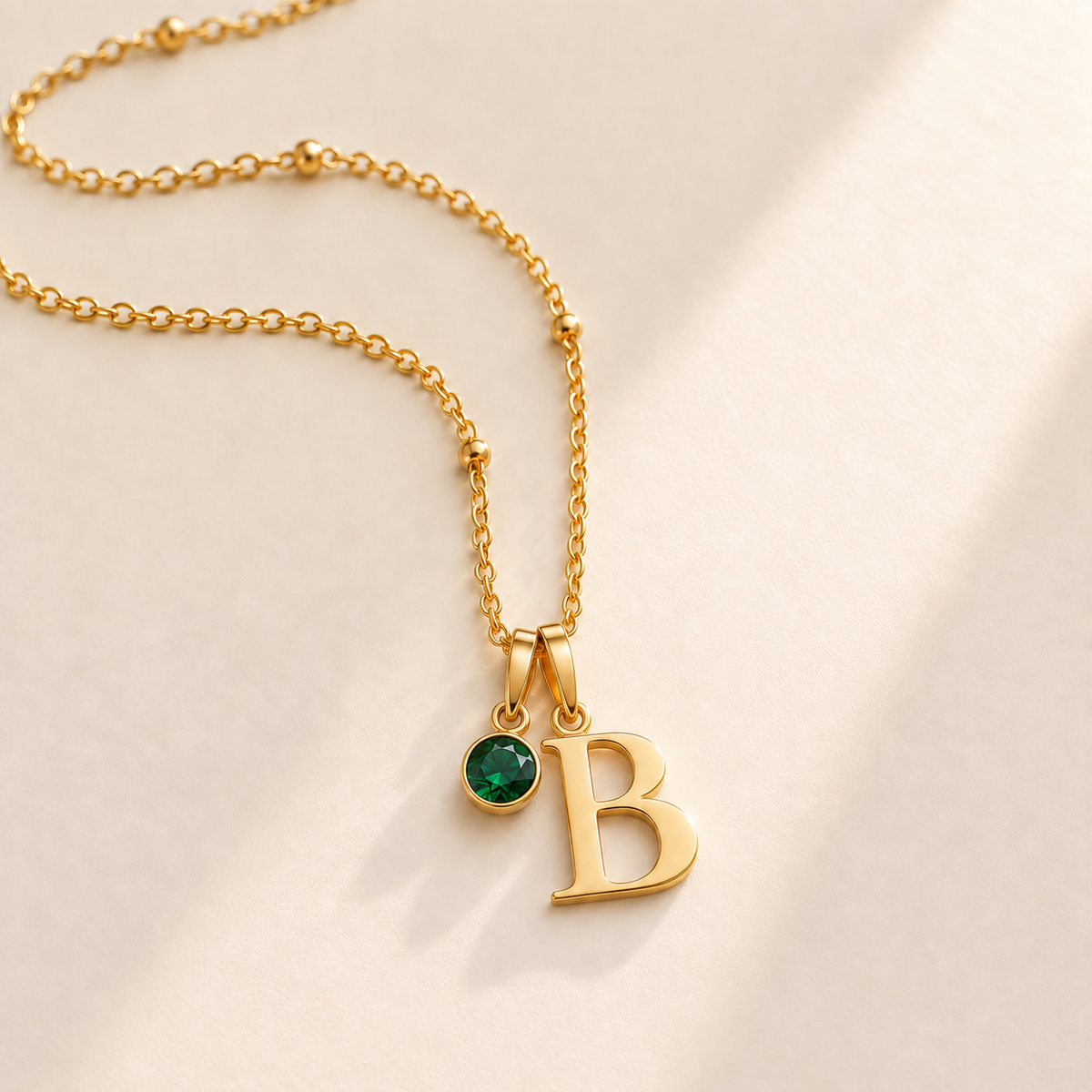 Custom Birthstone Initial Necklace stone may photo - two separate bails with serif initial B and round birthstone Anthology Jewelry