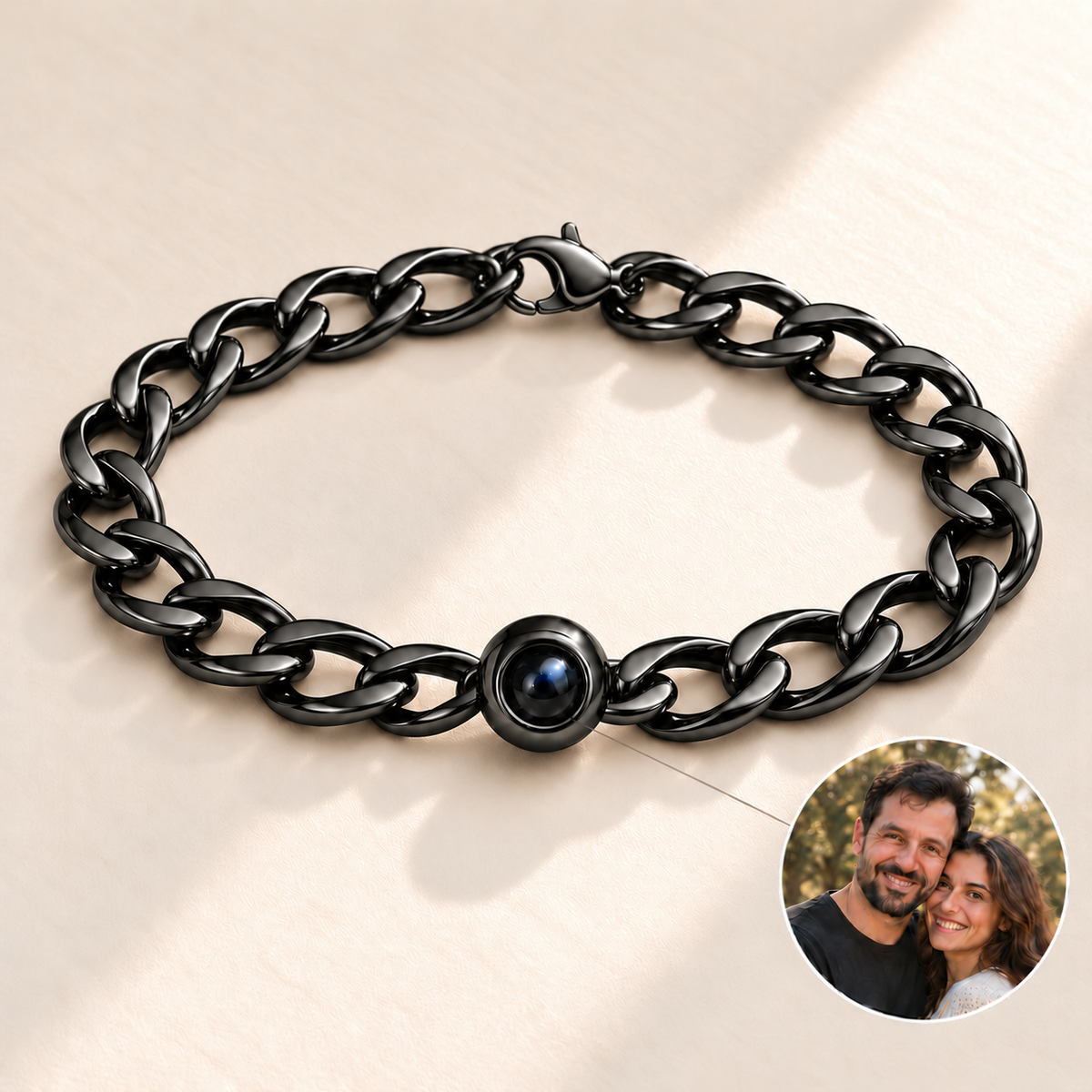 Custom Curb Link Photo Bracelet in Black, longer oval curb-link layout with simple back lobster clasp, dark projection lens and illustrative sample photo inset - Anthology Jewelry