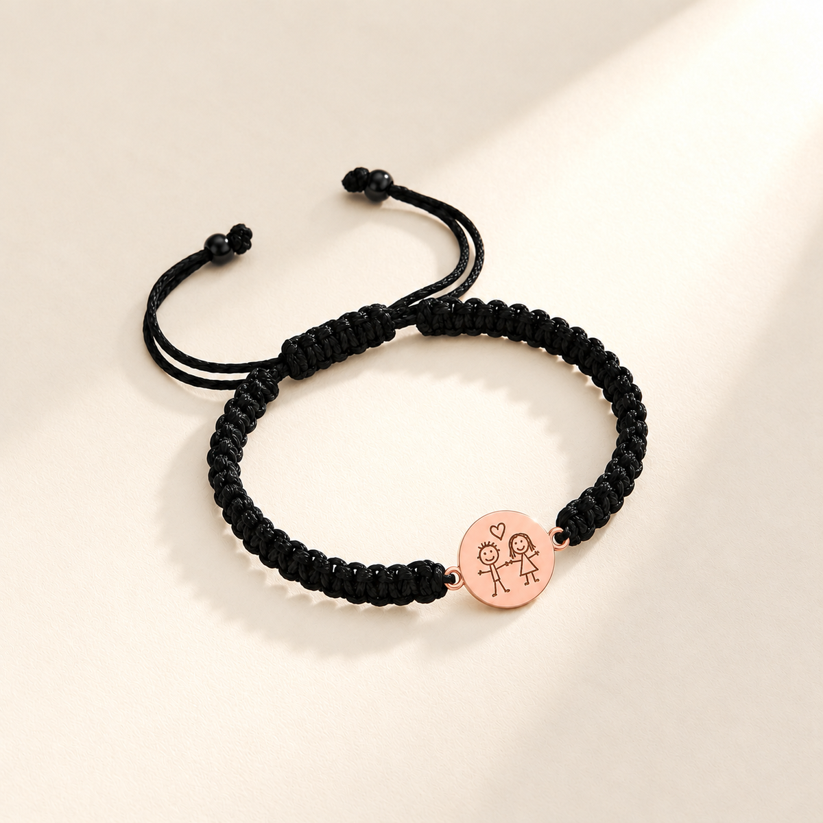Custom Drawing Bracelet Men's Black Braided Cord glamour photo - rose gold disc with two stick people and heart drawing Anthology Jewelry