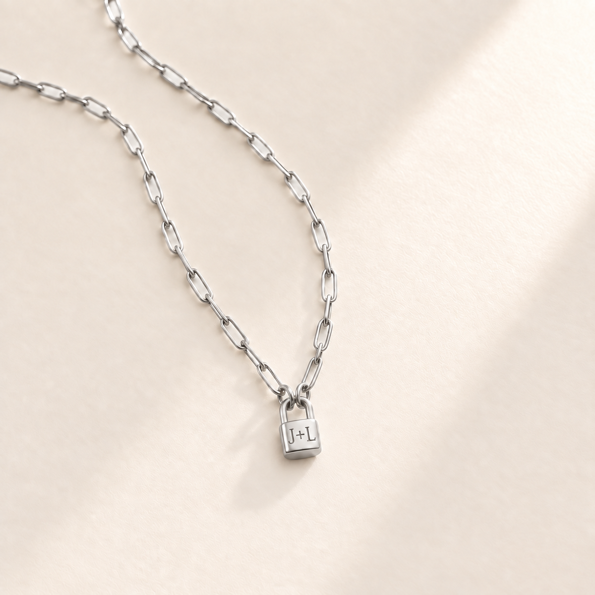 Custom Initial Lock Necklace hero silver photo - tiny closed padlock on paperclip chain Anthology Jewelry