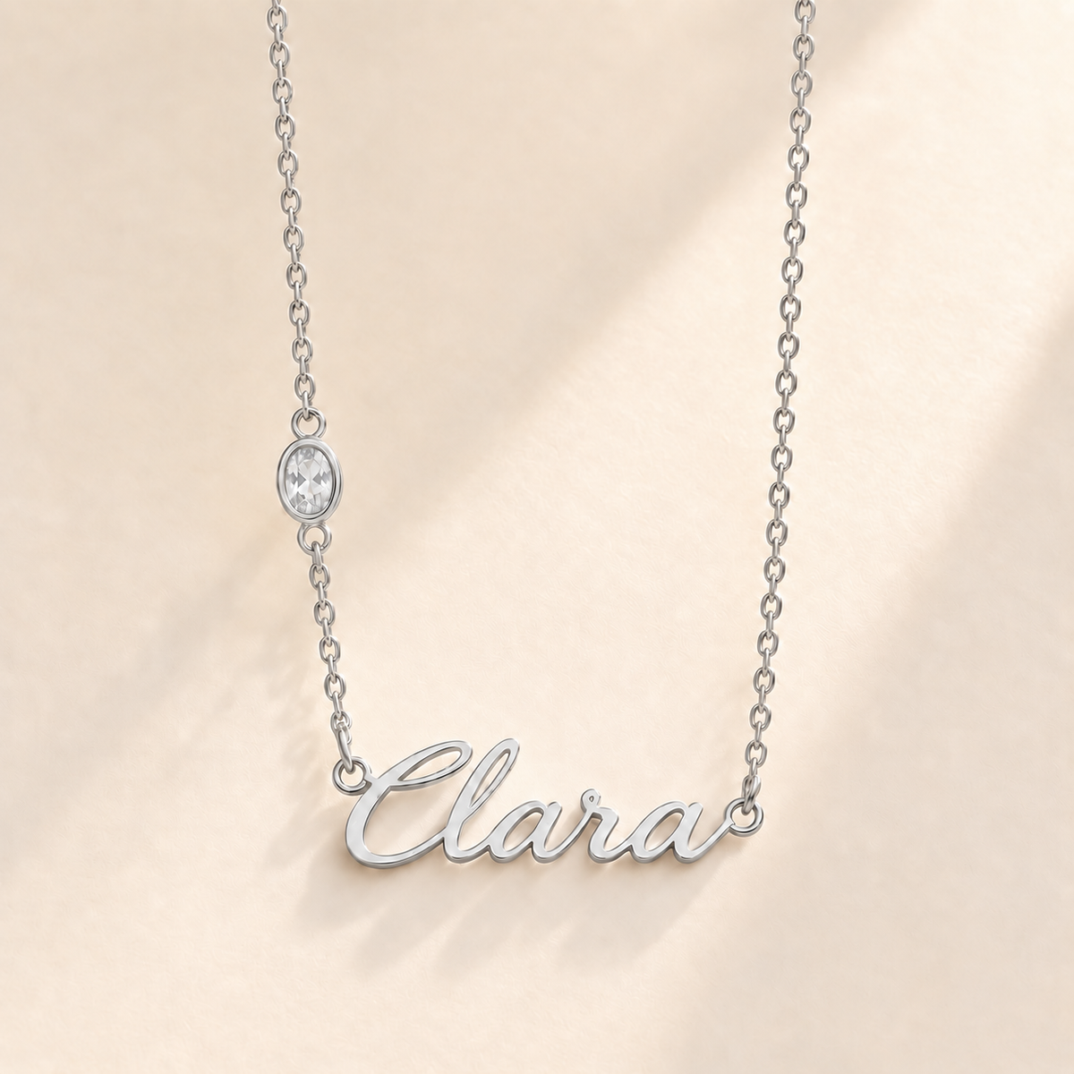 Custom Offset Birthstone Script Name Necklace april silver birthstone photo - Clara script with oval left-chain stone Anthology Jewelry
