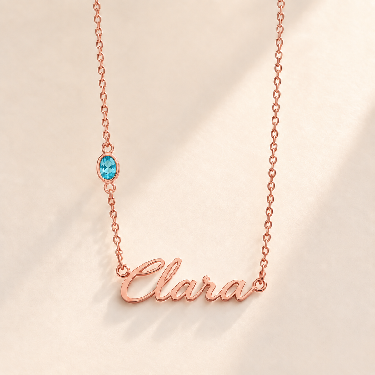 Custom Offset Birthstone Script Name Necklace december rose gold birthstone photo - Clara script with oval left-chain stone Anthology Jewelry