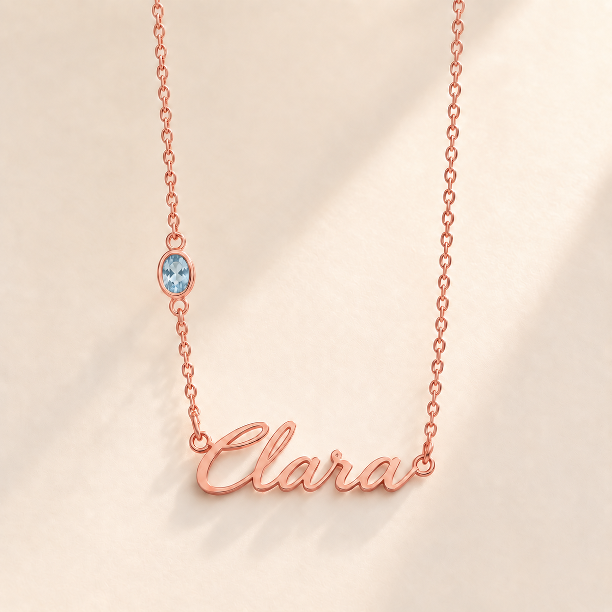Custom Offset Birthstone Script Name Necklace march rose gold birthstone photo - Clara script with oval left-chain stone Anthology Jewelry