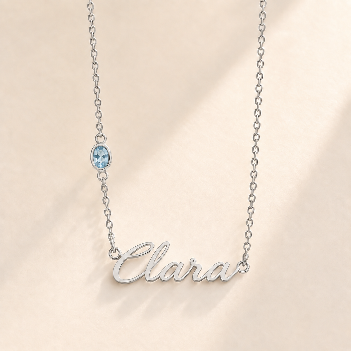 Custom Offset Birthstone Script Name Necklace march silver birthstone photo - Clara script with oval left-chain stone Anthology Jewelry