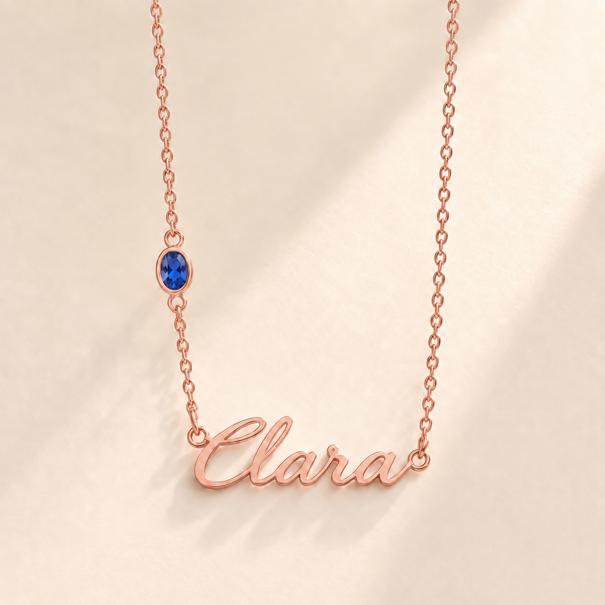 Custom Offset Birthstone Script Name Necklace september rose gold birthstone photo - Clara script with oval left-chain stone Anthology Jewelry
