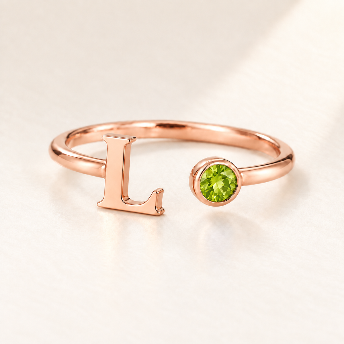 Custom Open Birthstone Initial Ring, rose gold august birthstone variant image; ivory background