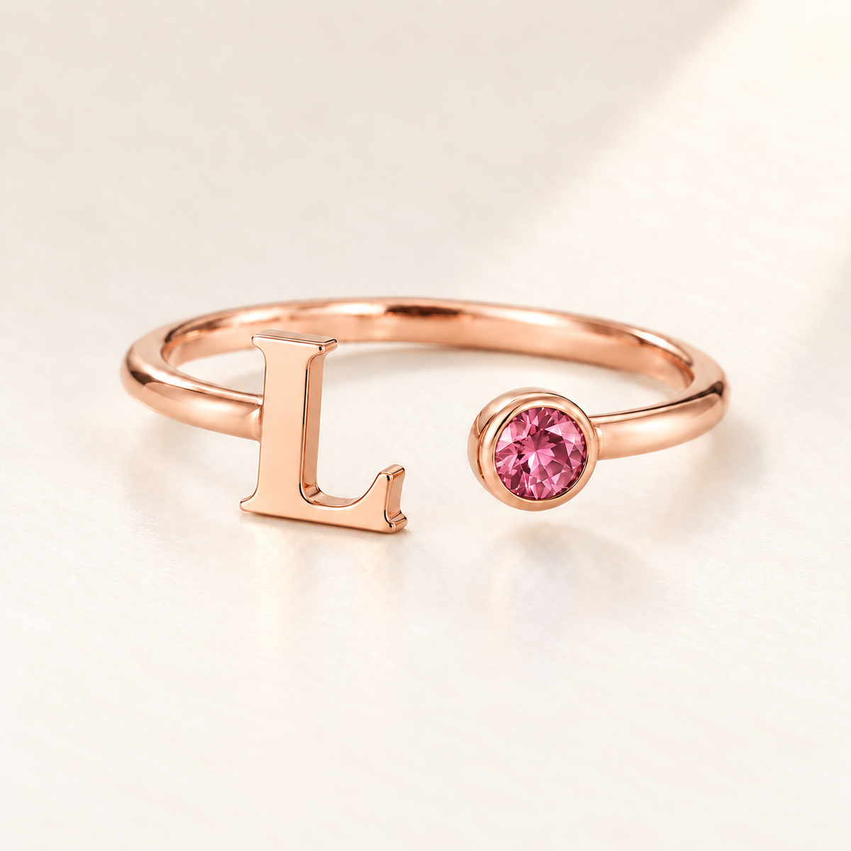 Custom Open Birthstone Initial Ring, rose gold october birthstone variant image; ivory background