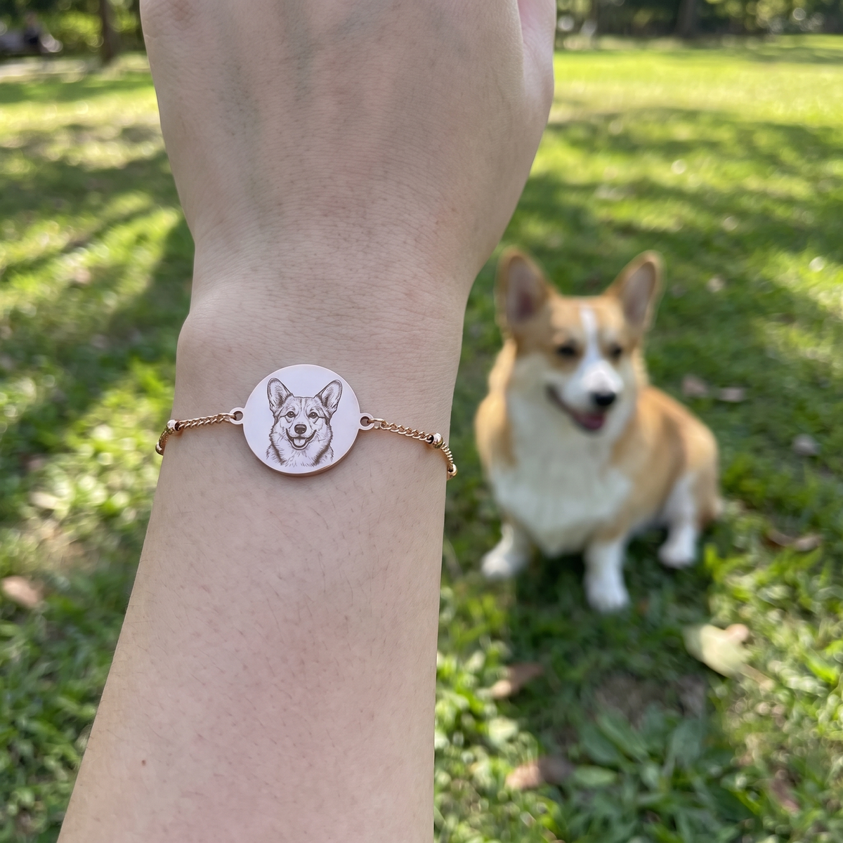 Custom Pet Portrait Bracelet UGC photo - rose gold corgi portrait bracelet worn at the park with a corgi Anthology Jewelry