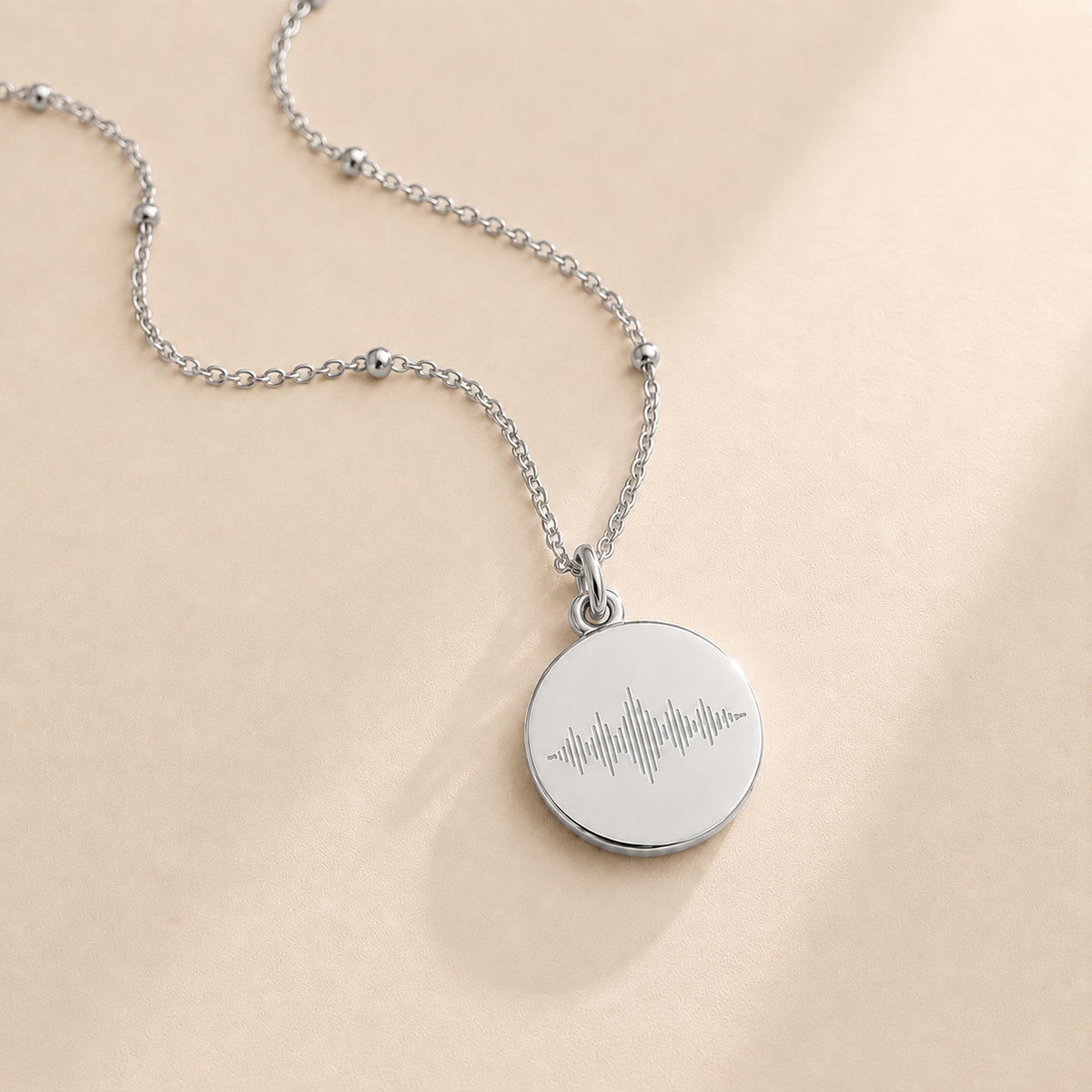 Custom Soundwave Necklace Disc Pendant close up detail - engraved soundwave disc Anthology Jewelry