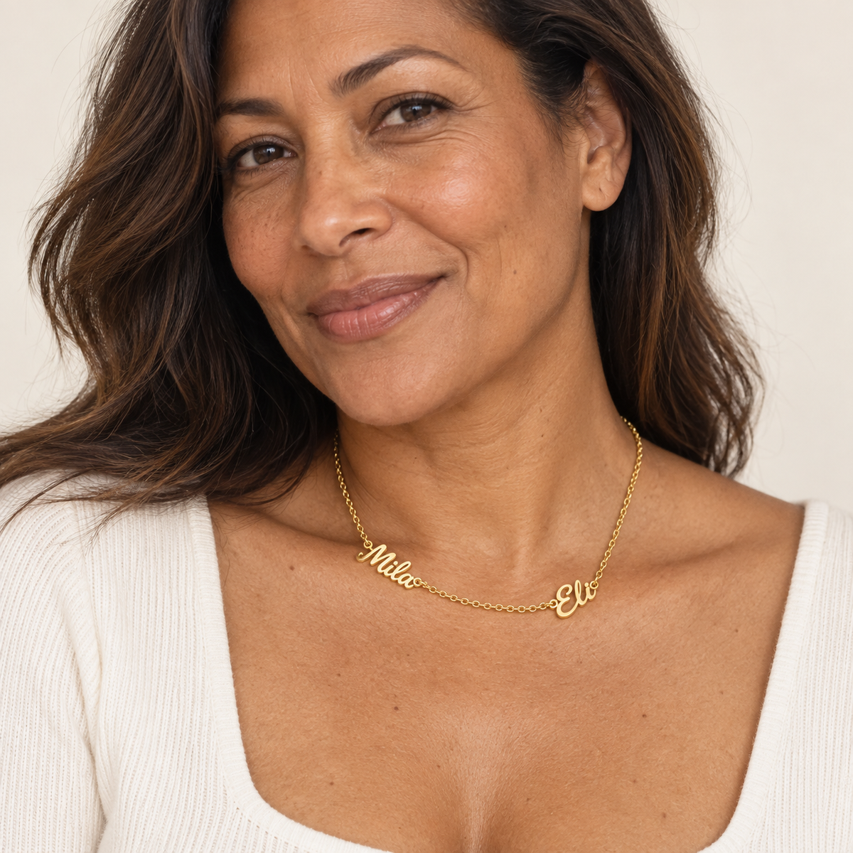 Custom Spaced Names Necklace second lifestyle photo - two-name script necklace worn close up Anthology Jewelry
