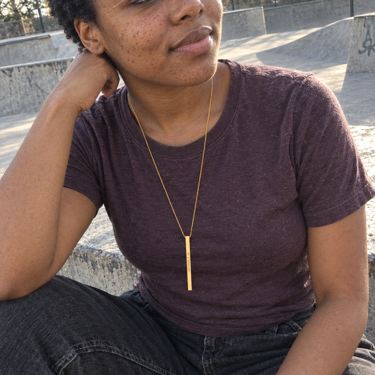 Custom Thin Column Necklace customer photo - woman at a skate park wearing gold column necklace Anthology Jewelry