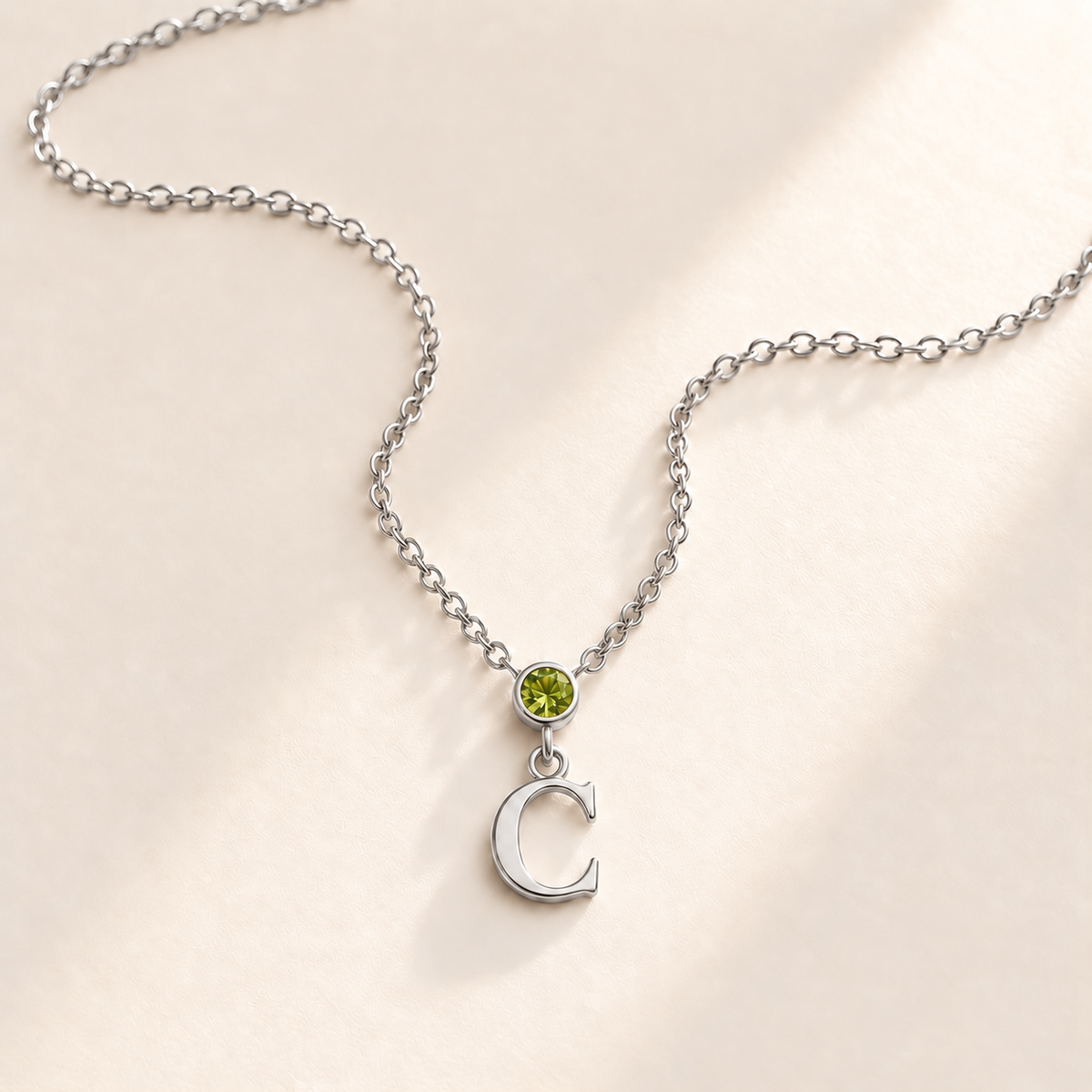 Custom Vertical Birthstone Initial Necklace august silver birthstone photo - round inline stone with hanging serif C Anthology Jewelry