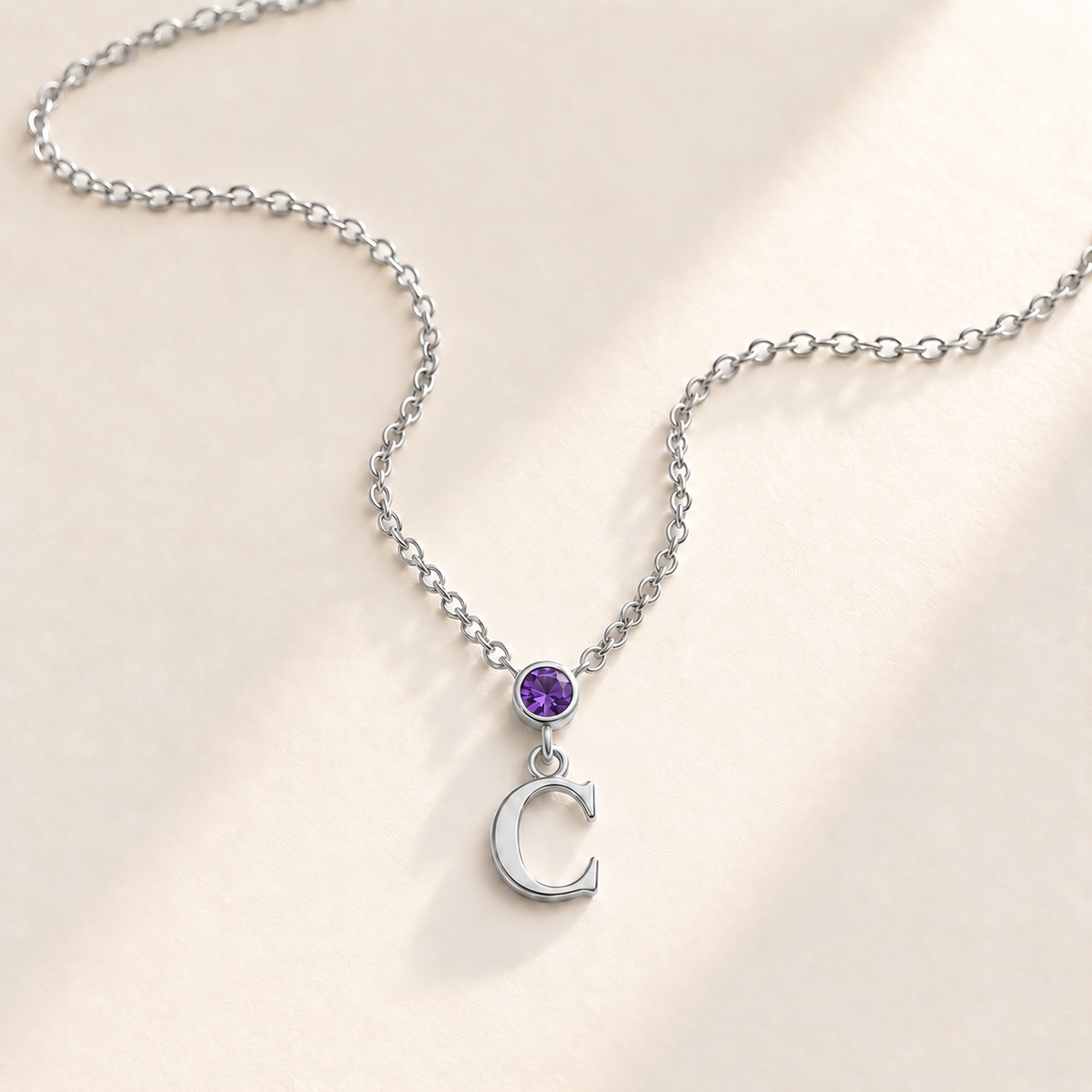 Custom Vertical Birthstone Initial Necklace february silver birthstone photo - round inline stone with hanging serif C Anthology Jewelry