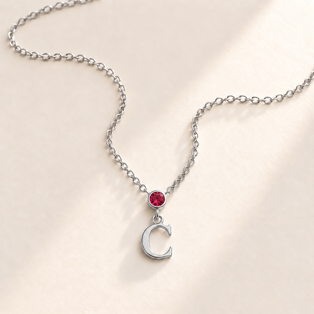 Custom Vertical Birthstone Initial Necklace july silver birthstone photo - round inline stone with hanging serif C Anthology Jewelry