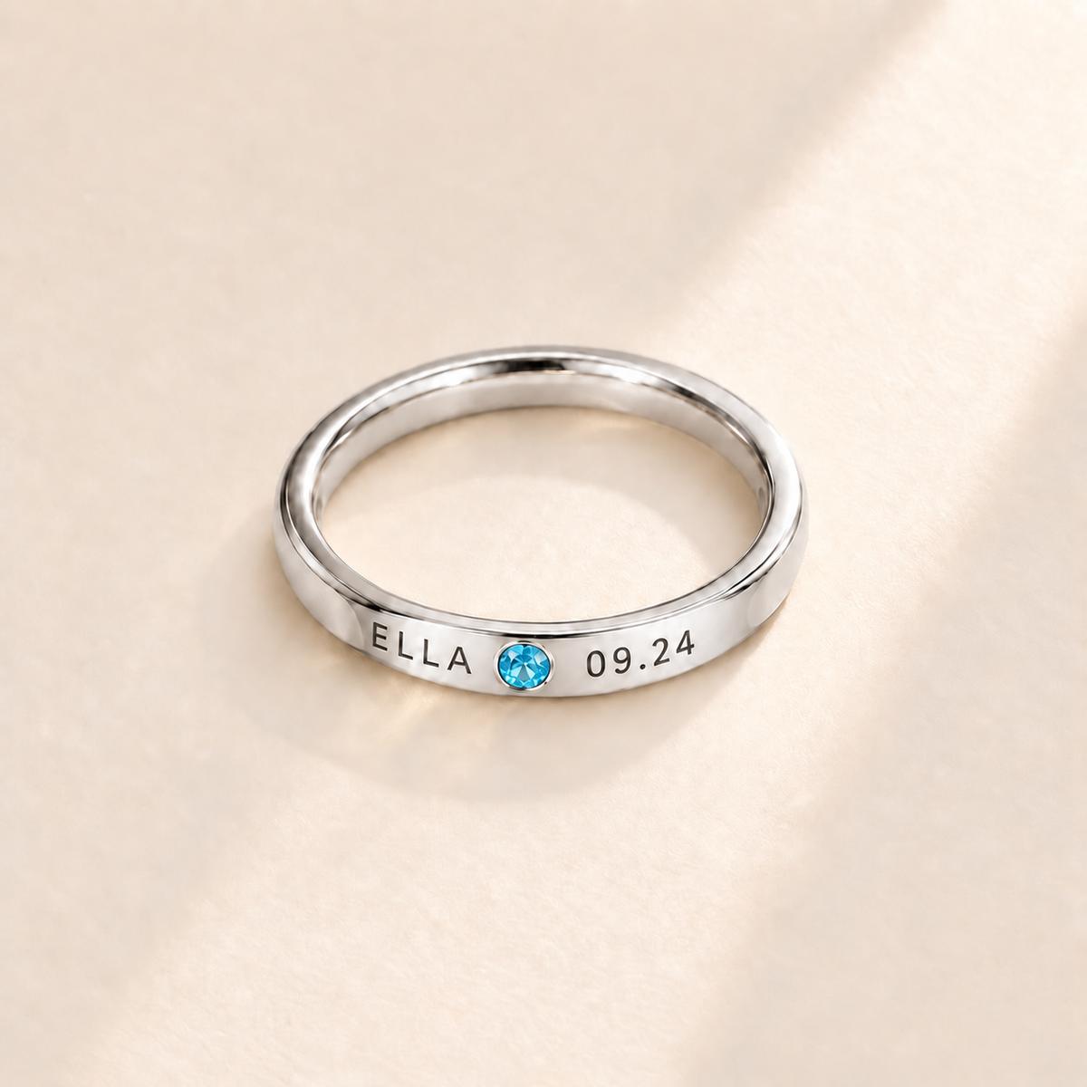 Custom Date & Name Birthstone Stacking Ring, December Blue Topaz, Silver finish. Illustrative product rendering; natural gemstone colors may vary.