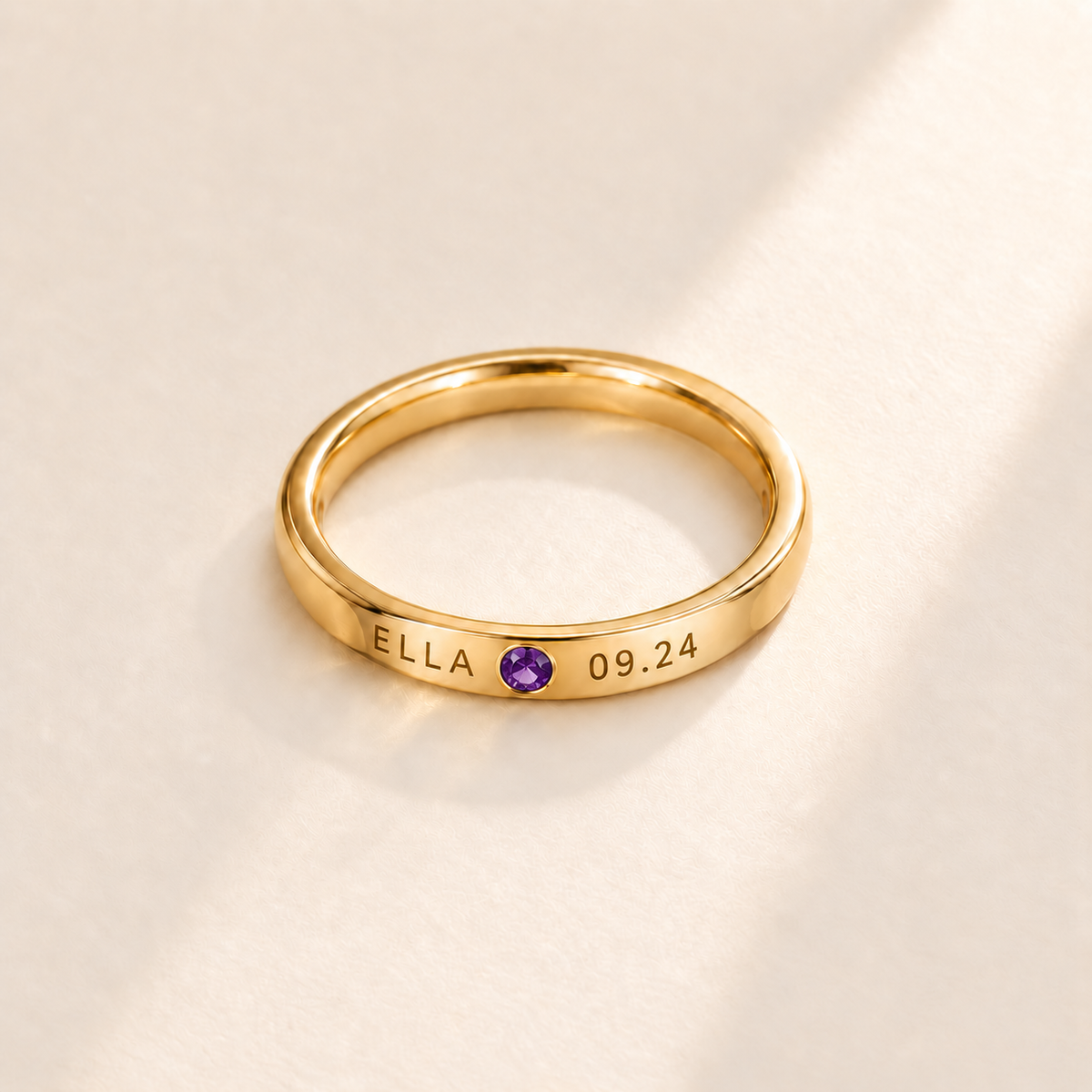 Custom Date & Name Birthstone Stacking Ring, February Amethyst, Gold finish. Illustrative product rendering; natural gemstone colors may vary.