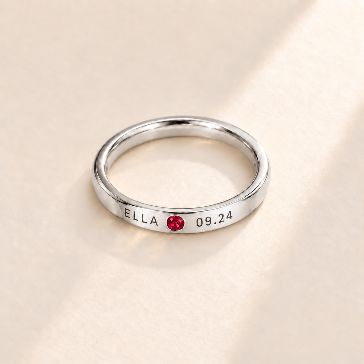 Custom Date & Name Birthstone Stacking Ring, July Ruby, Silver finish. Illustrative product rendering; natural gemstone colors may vary.