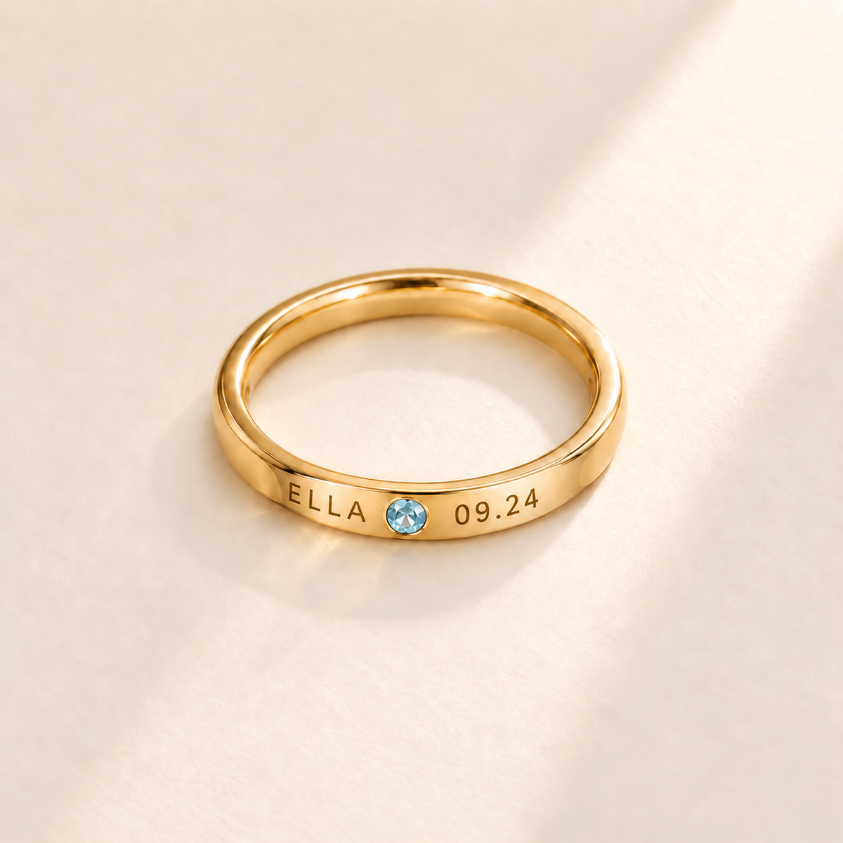 Custom Date & Name Birthstone Stacking Ring, March Aquamarine, Gold finish. Illustrative product rendering; natural gemstone colors may vary.
