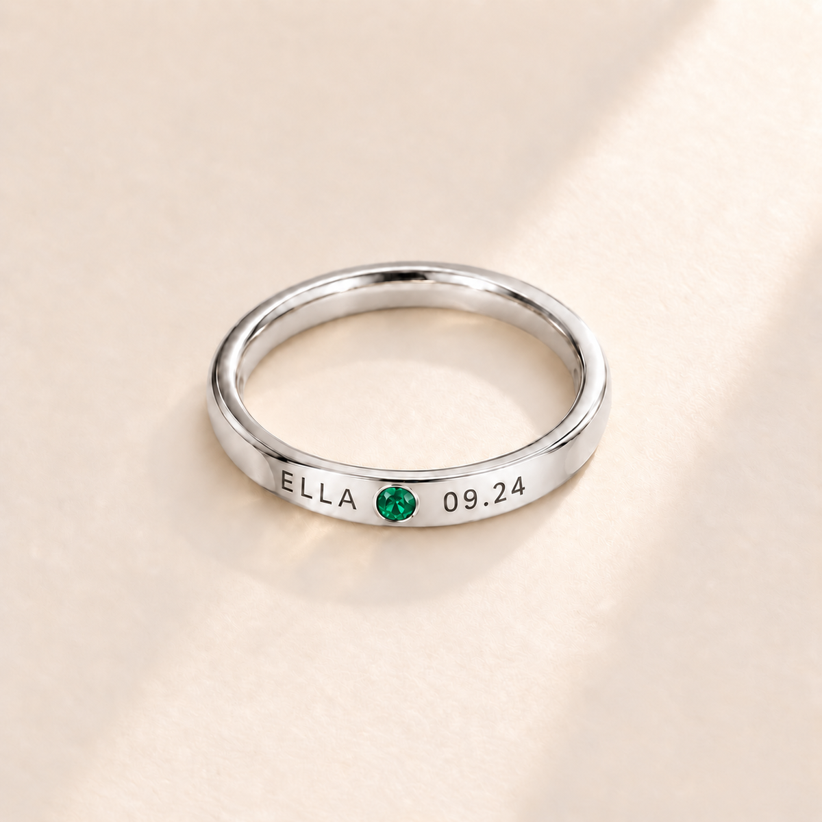 Custom Date & Name Birthstone Stacking Ring, May Emerald, Silver finish. Illustrative product rendering; natural gemstone colors may vary.