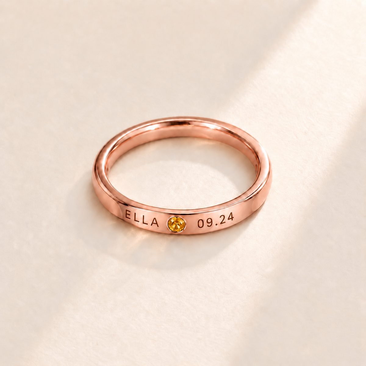 Custom Date & Name Birthstone Stacking Ring, November Citrine, Rose Gold finish. Illustrative product rendering; natural gemstone colors may vary.