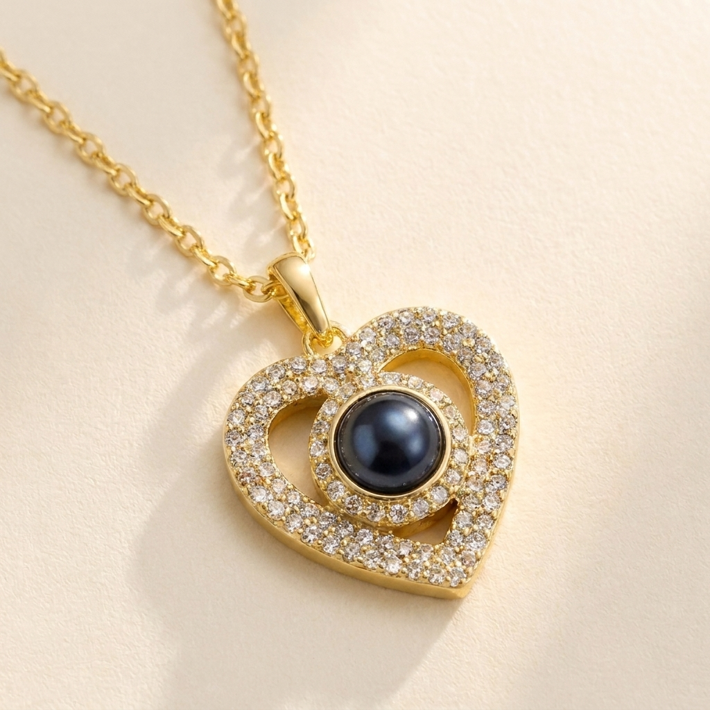 Pavé Halo Photo Heart Necklace detail photo - close-up of pave heart outline and circular pave halo around dark photo projection cabochon Anthology Jewelry