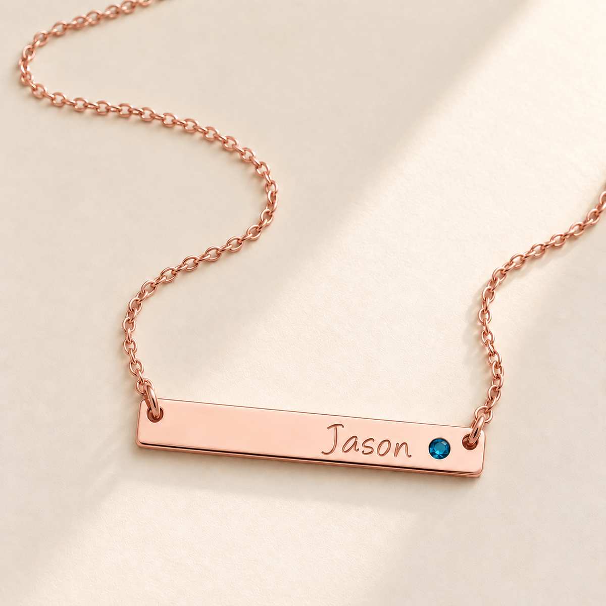 Personalized Bar Necklace with Birthstone hero photo - rose gold Jason necklace with blue birthstone Anthology Jewelry