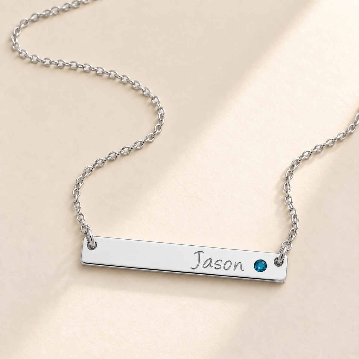Personalized Bar Necklace with Birthstone hero photo - silver Jason necklace with blue birthstone Anthology Jewelry