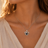 Silver swirl knot photo projection necklace lifestyle sunset - Anthology Jewelry