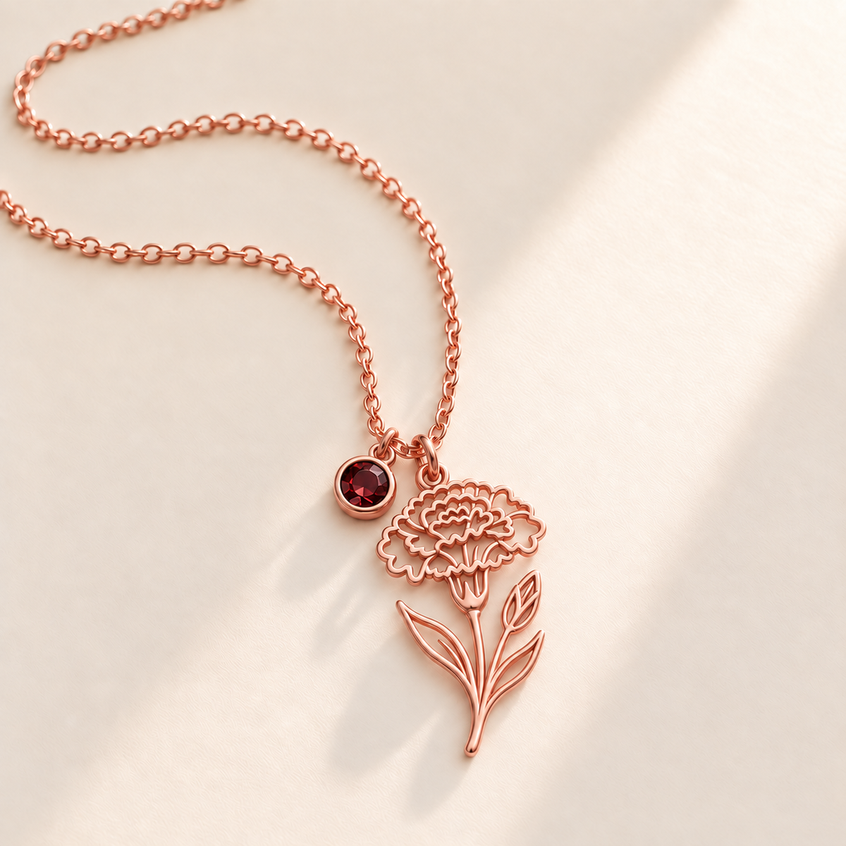 Custom Birth Flower & Birthstone Necklace hero photo - Rose Gold January carnation birth flower charm with Garnet birthstone Anthology Jewelry