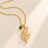 Custom Birth Flower & Birthstone Necklace hero photo - Gold May lily of the valley birth flower charm with Emerald birthstone Anthology Jewelry