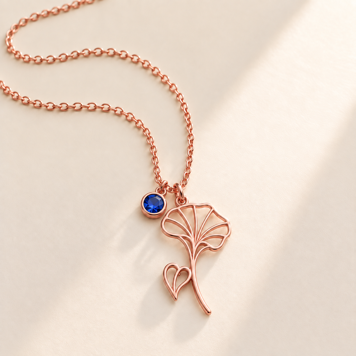 Custom Birth Flower & Birthstone Necklace hero photo - Rose Gold September morning glory birth flower charm with Sapphire birthstone Anthology Jewelry