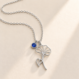 Custom Birth Flower & Birthstone Necklace hero photo - Silver September morning glory birth flower charm with Sapphire birthstone Anthology Jewelry