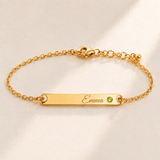Birthstone Bar Bracelet hero photo - gold august peridot with Emma engraving in Great Vibes Anthology Jewelry
