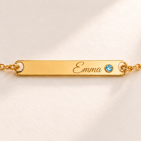 Birthstone Bar Bracelet macro detail photo - gold Emma engraving and smaller round pale blue March gemstone Anthology Jewelry