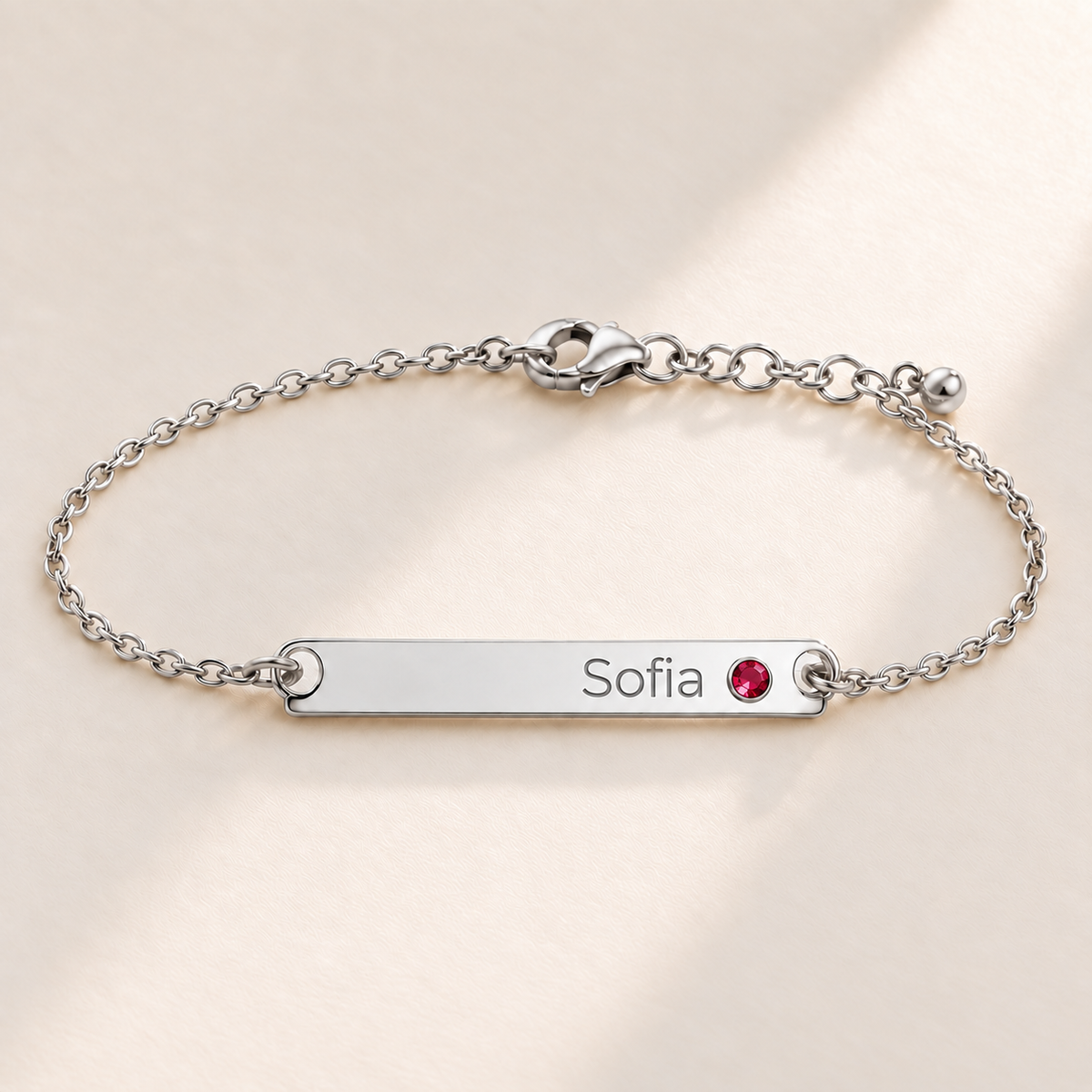 Birthstone Bar Bracelet hero photo - silver july ruby with Sofia engraving in Montserrat Anthology Jewelry