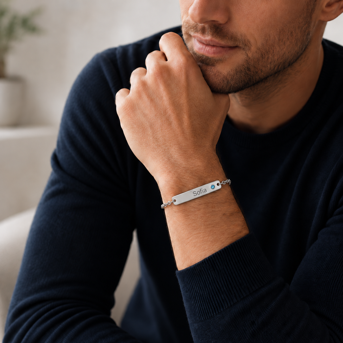 Birthstone Bar Bracelet lifestyle photo - silver Sofia engraving and smaller round blue gemstone Anthology Jewelry
