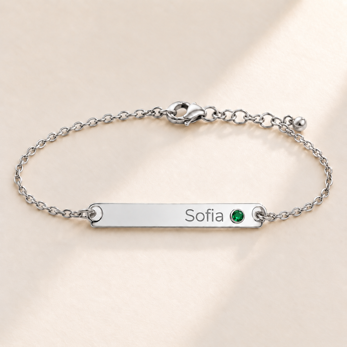 Birthstone Bar Bracelet hero photo - silver may emerald with Sofia engraving in Montserrat Anthology Jewelry