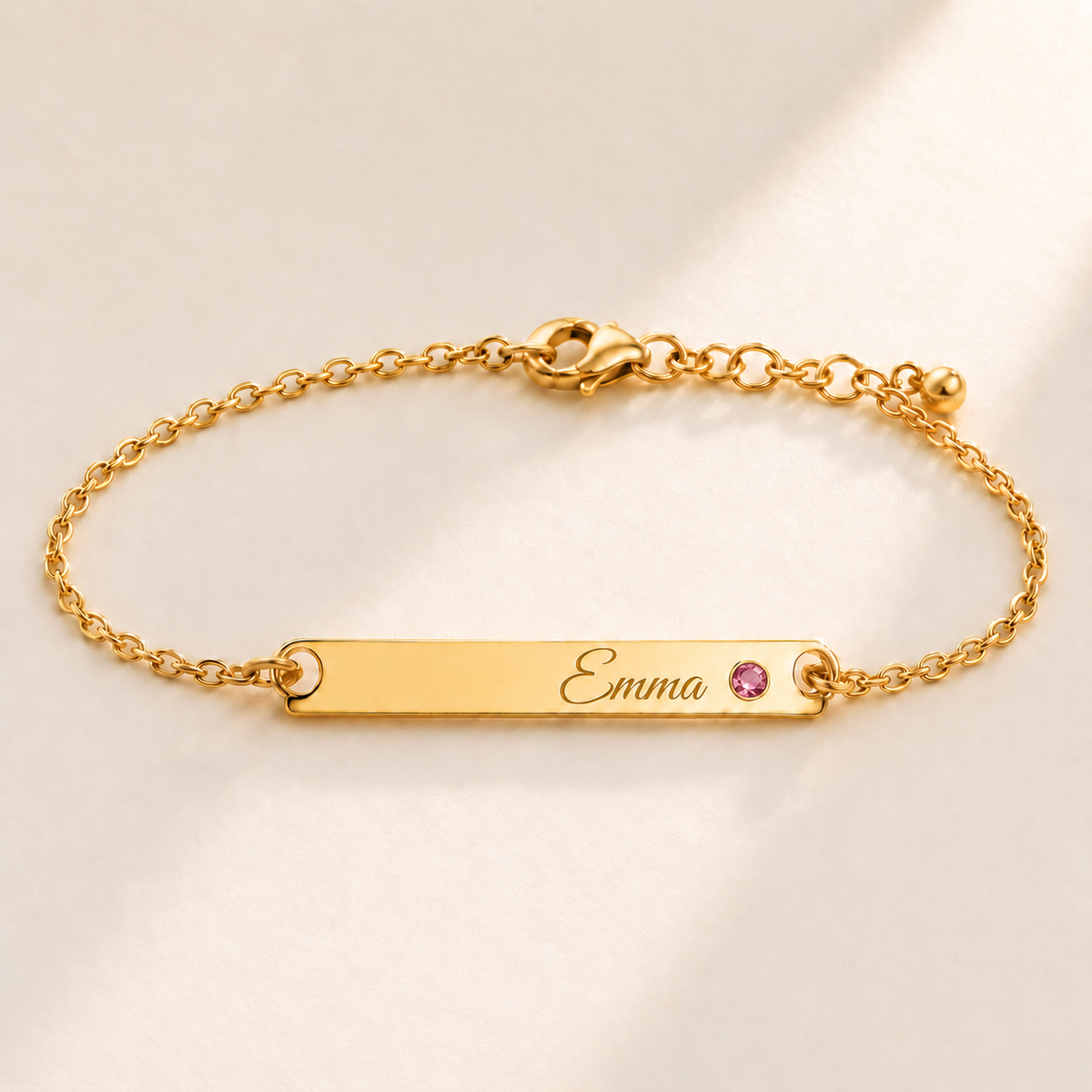 Birthstone Bar Bracelet hero photo - gold october tourmaline with Emma engraving in Great Vibes Anthology Jewelry