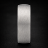 Macro glamour shot of a brushed tungsten two-toned ring with dramatic lighting - Anthology Jewelry