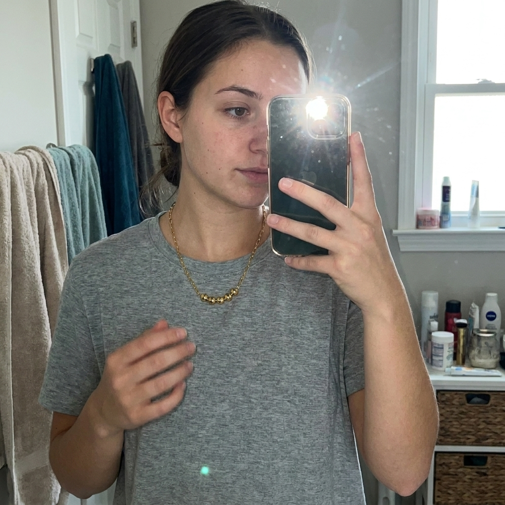 Custom Add-A-Bead Necklace customer photo - mirror selfie wearing gold name bead necklace Anthology Jewelry