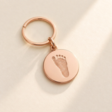 Custom Baby Handprint or Footprint Keychain hero photo - rose gold baby footprint keepsake keychain Anthology Jewelry