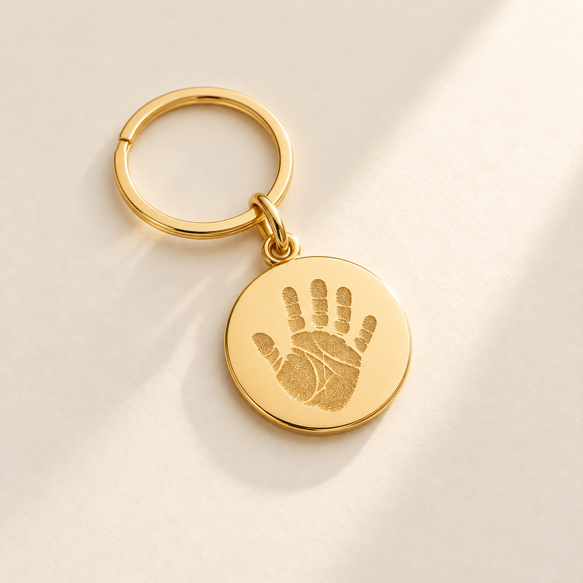 Custom Baby Handprint or Footprint Keychain hero photo - gold handprint keepsake keychain Anthology Jewelry