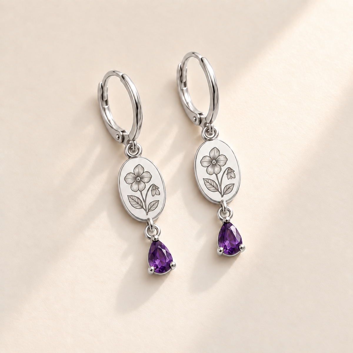 Custom Birth Flower & Birthstone Drop Earrings February silver hero photo - violet engraved medallions with purple pear stones Anthology Jewelry